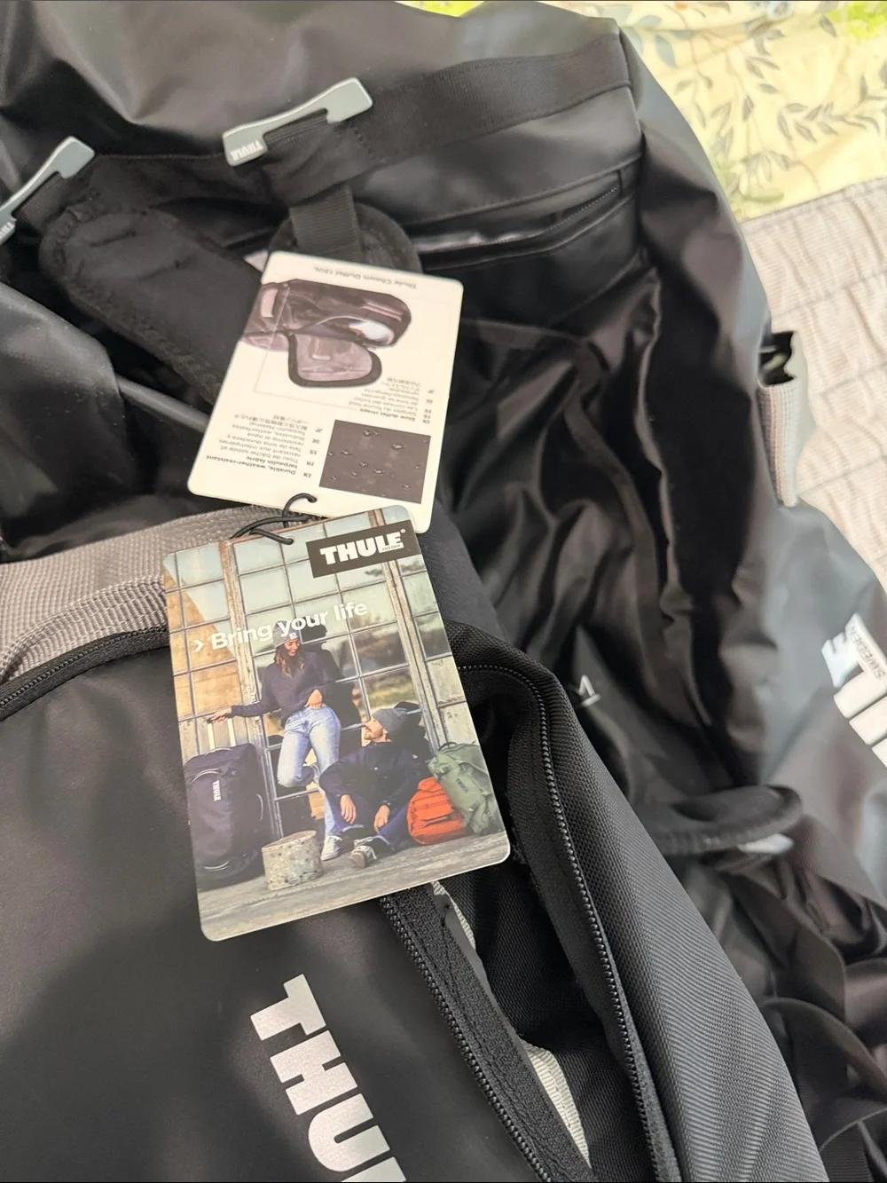 Thule Chasm Duffle 130L Black Travel Duffle with Gray Mesh Pocket